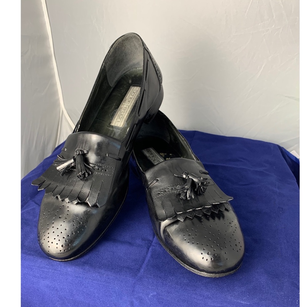 Daniele Ferradini 
Black fringe loafers
